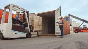 Logistics team loading cargo for freight shipping companies
